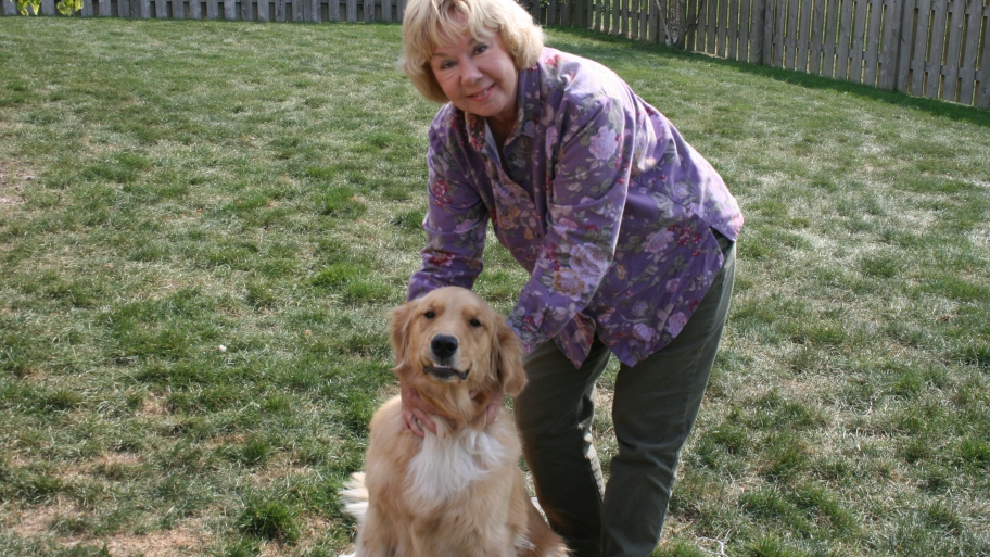woman with golden retriever